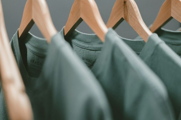 Folded WormBrand heavyweight tees